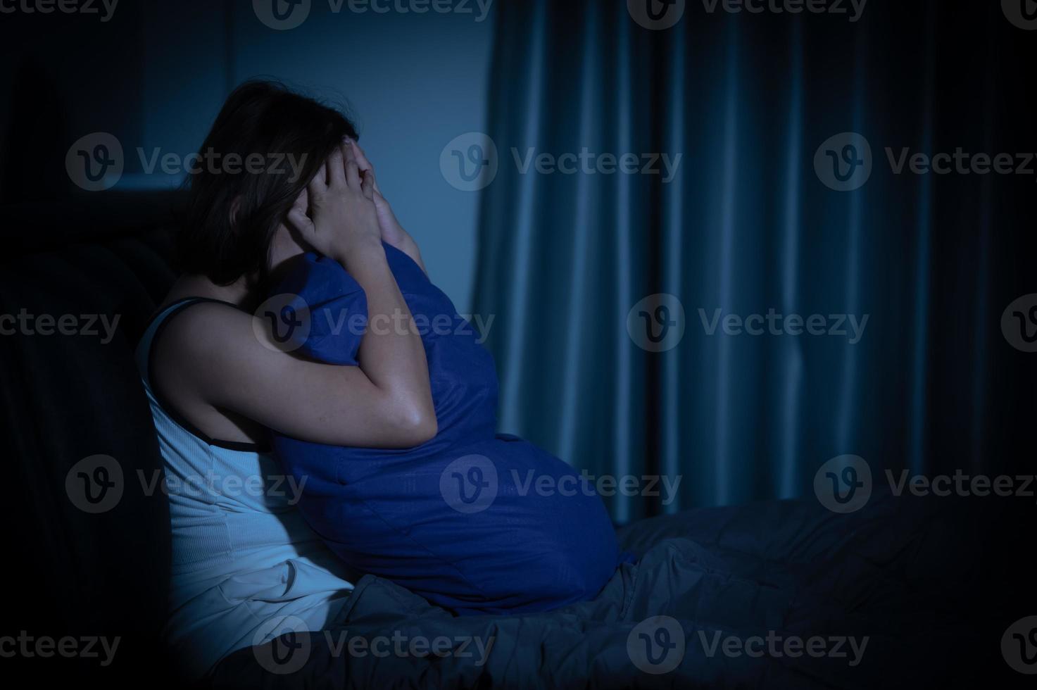 Asian women have a high concern that is why she can't sleep.Have stress from work photo