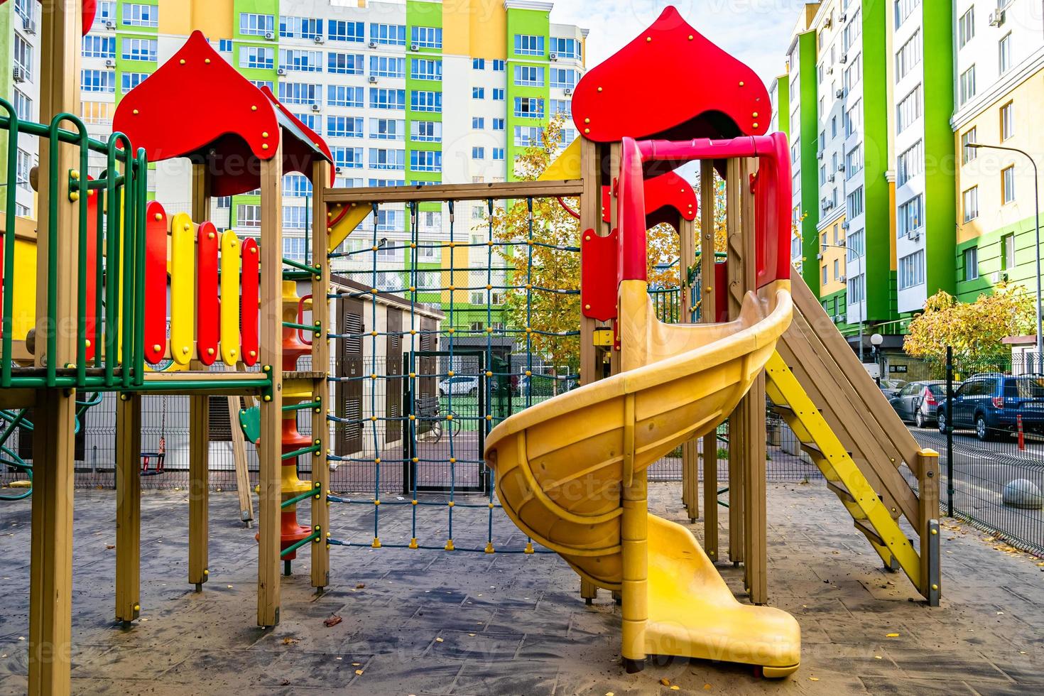 Photography on theme empty playground with metal slide for kids photo