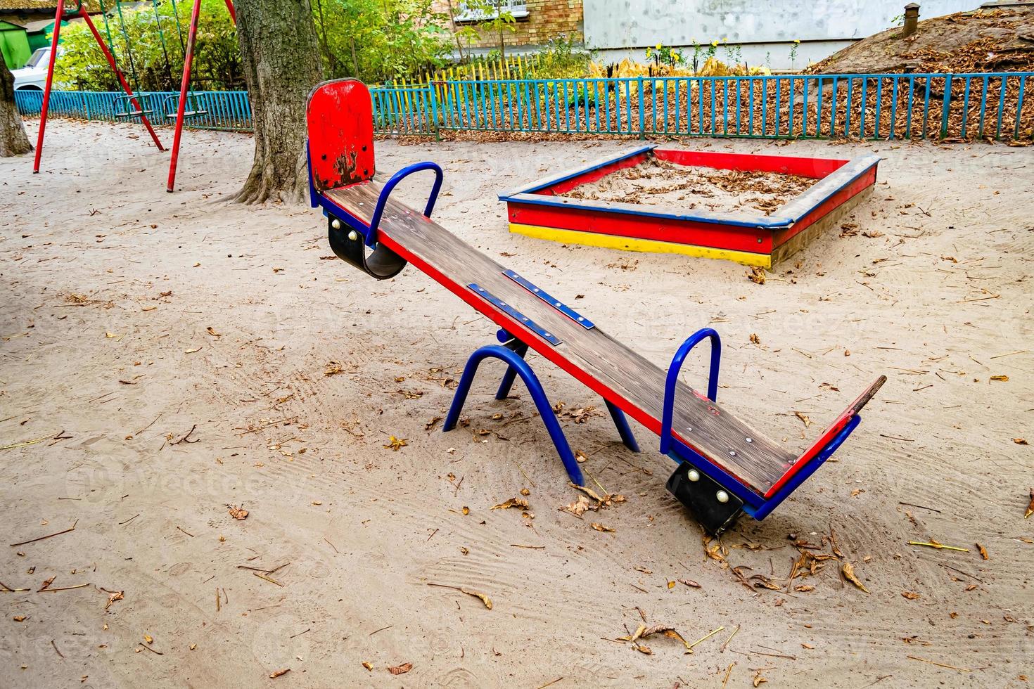 Photography on theme empty playground with metal swing for kids photo