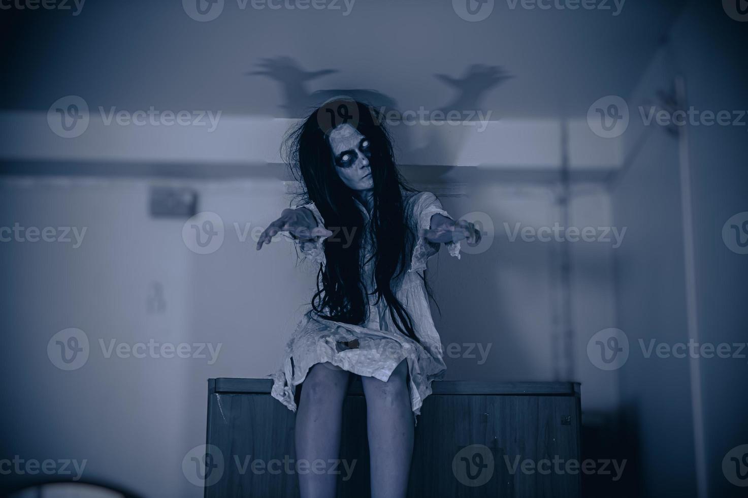 Portrait of asian woman make up ghost,Scary horror scene for background,Halloween festival concept,Ghost movies poster,angry spirit in the apartment photo