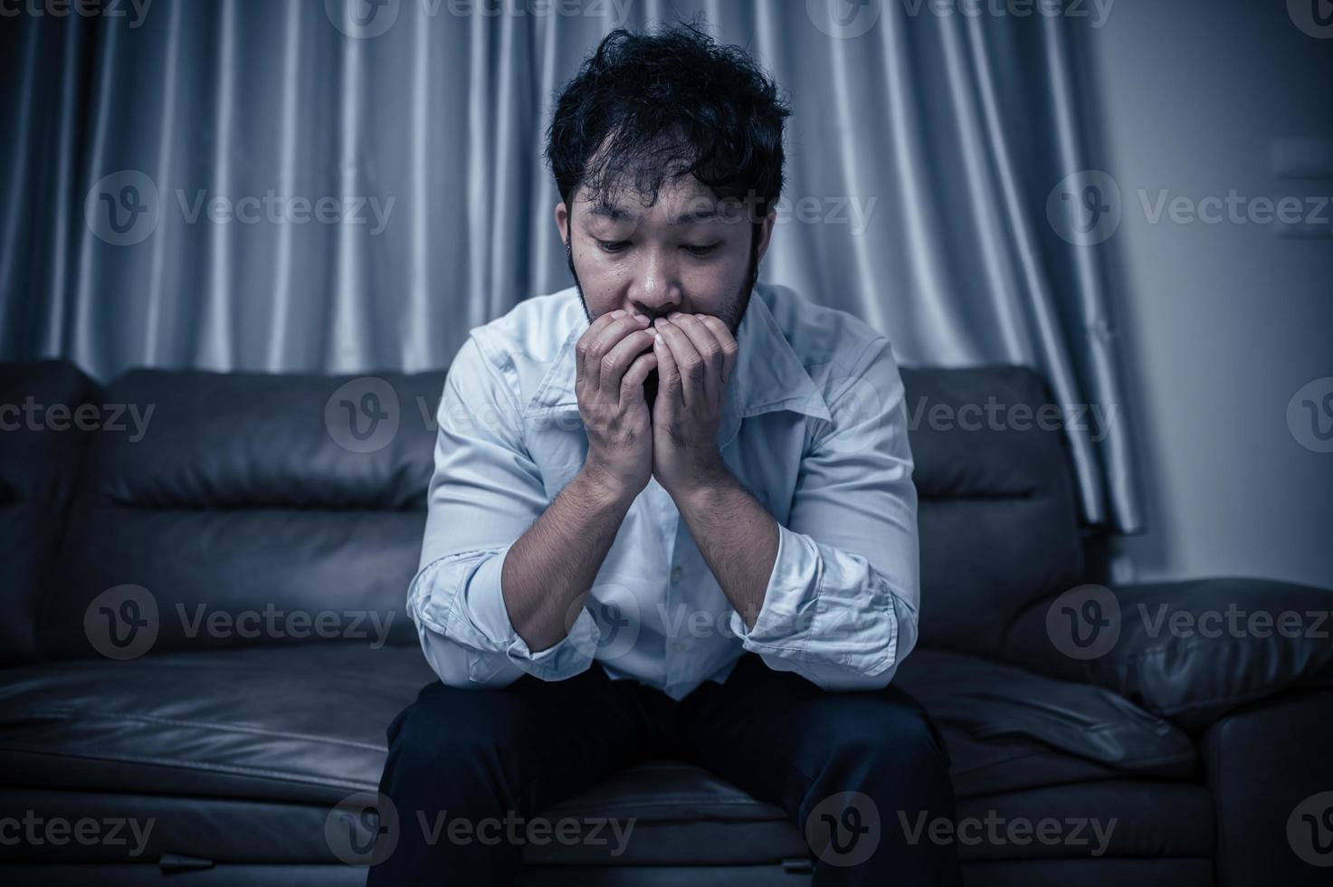 Asian handsome man stress from work overload,Tired male come back home after a lot of work from company,risk of depression photo