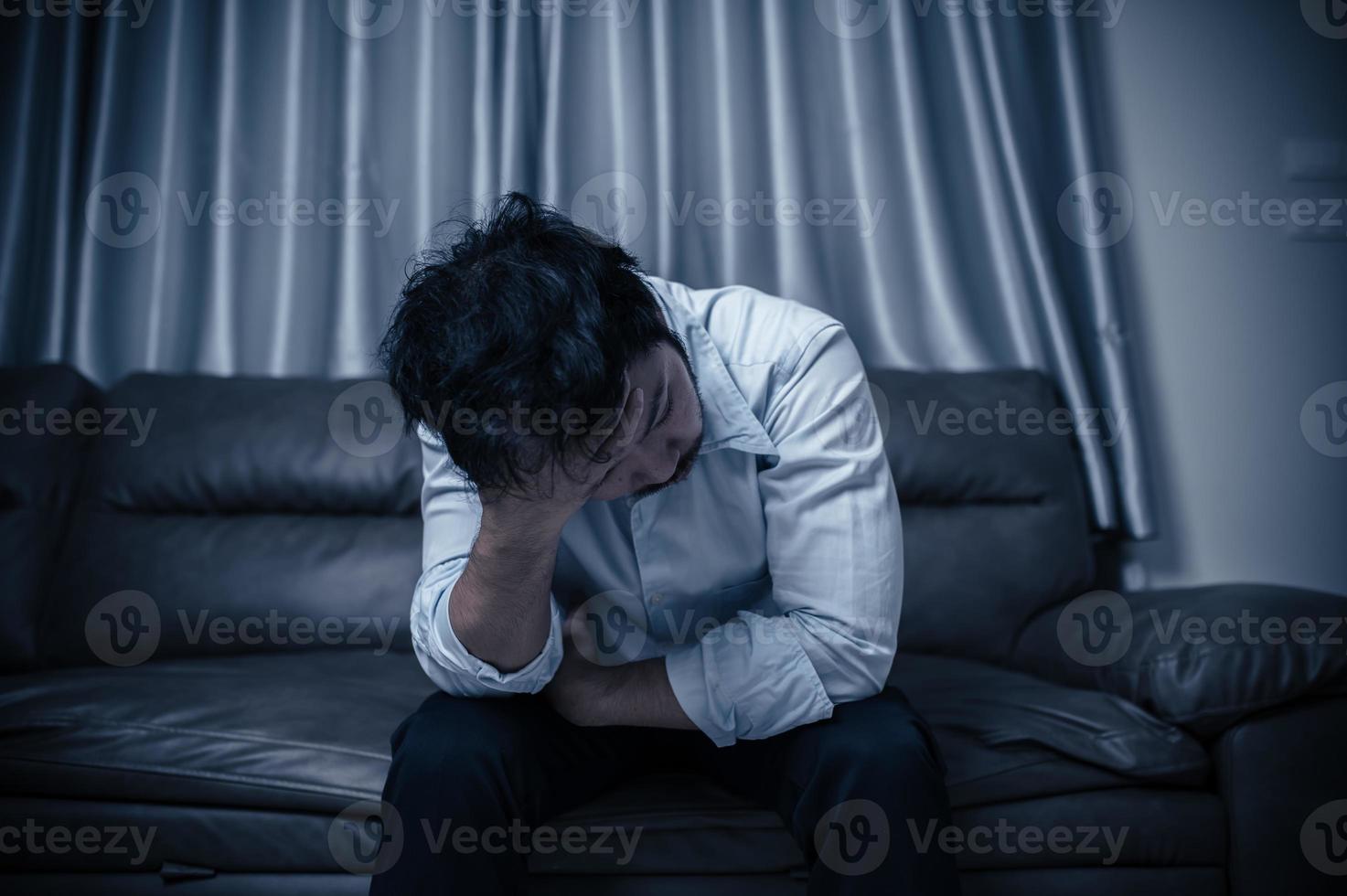 Asian handsome man stress from work overload,Tired male come back home after a lot of work from company,risk of depression photo