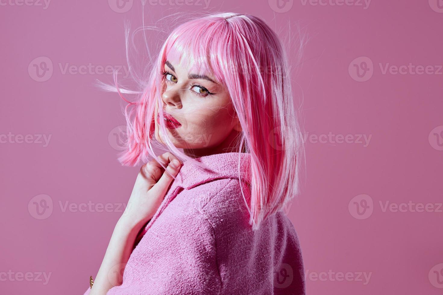 Portrait of a charming lady in a pink blazer pink wig cropped view studio model unaltered photo