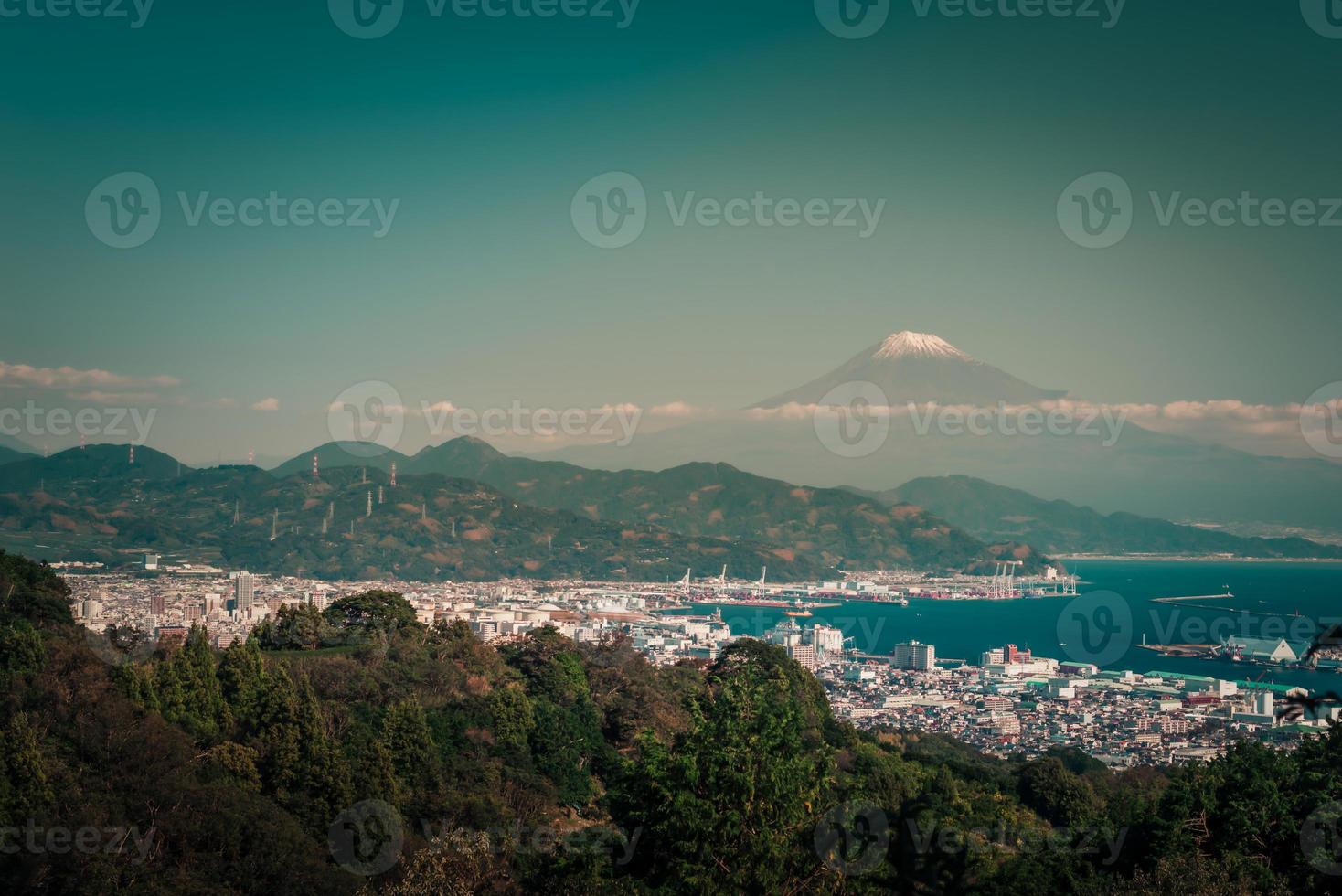 Mt. Fuji with Japan industry zone at sunset Shizuoka prefecture, Japan. photo