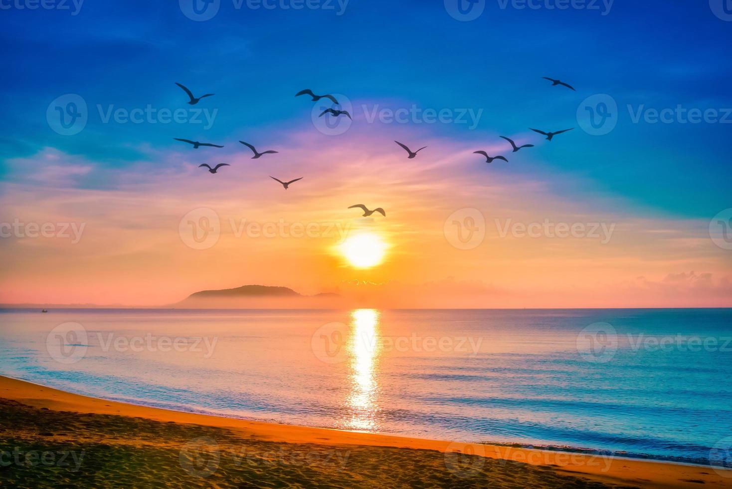 Landscapes of sunset on the beach with colorful sky background. photo