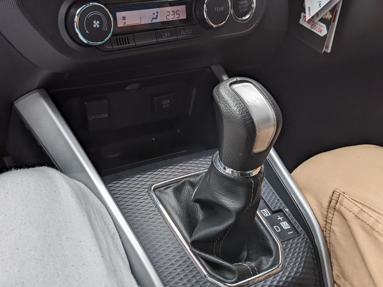 A close up of car gear shift photo