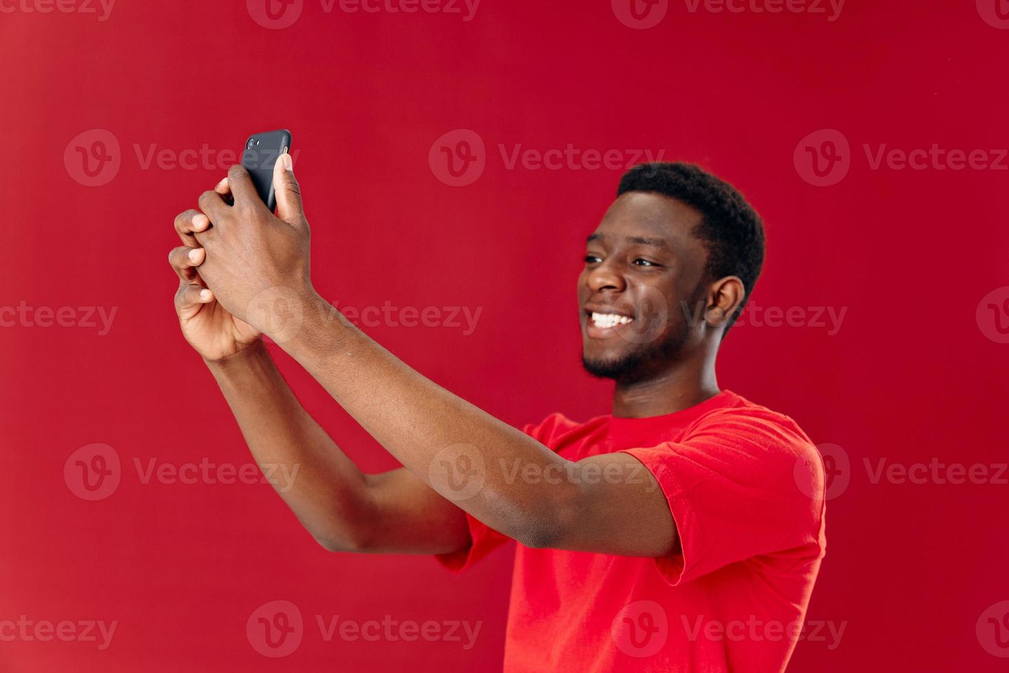 Cheerful man with phone in hands psychology communication joy isolated background photo