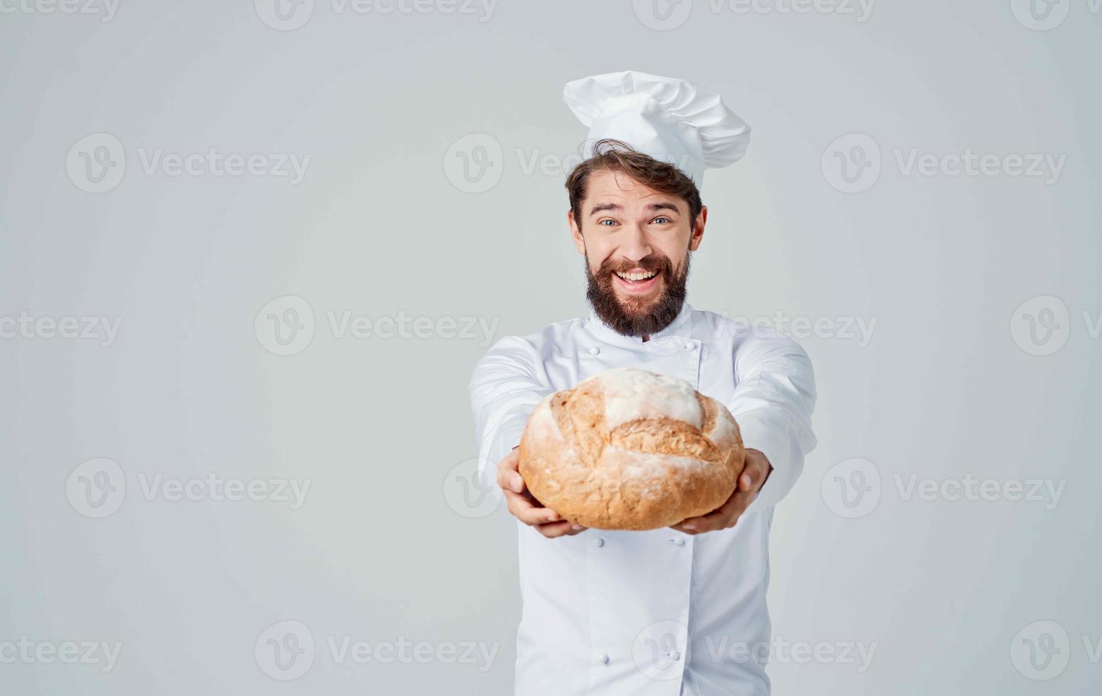 chef with bread in his hands food preparation restaurant professionals photo