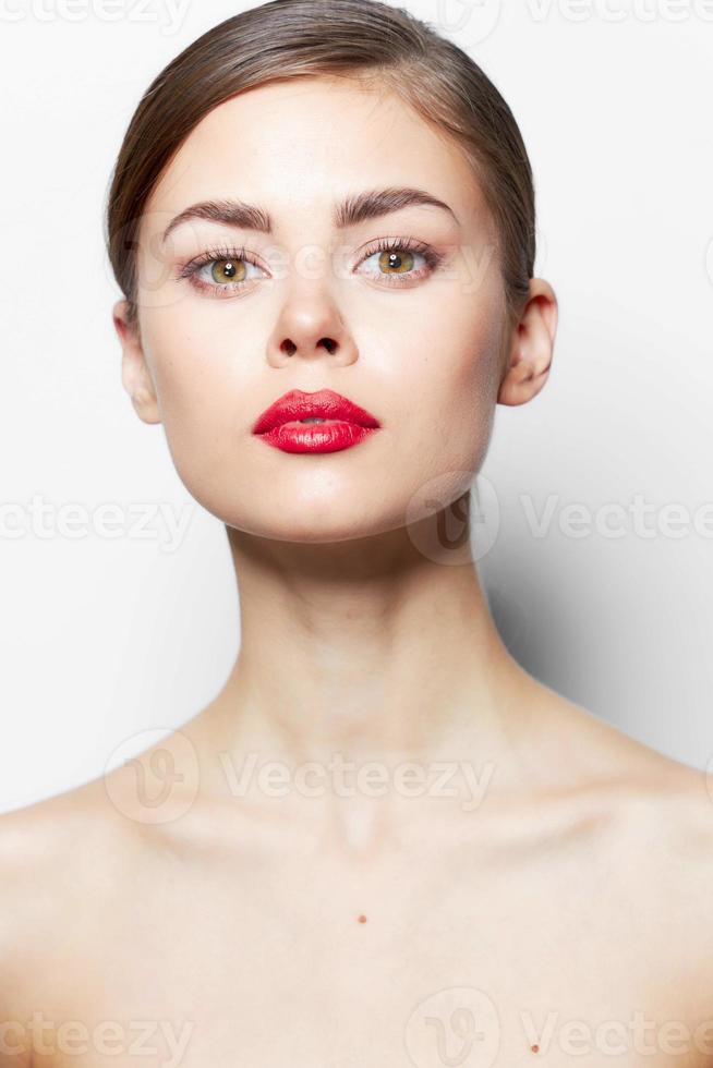 Woman with naked shoulders attractive look red lips glamor photo