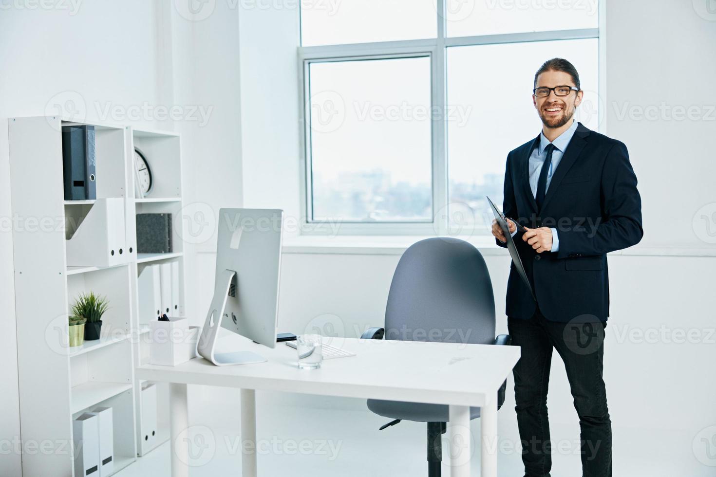 office worker near the desktop work process computer photo