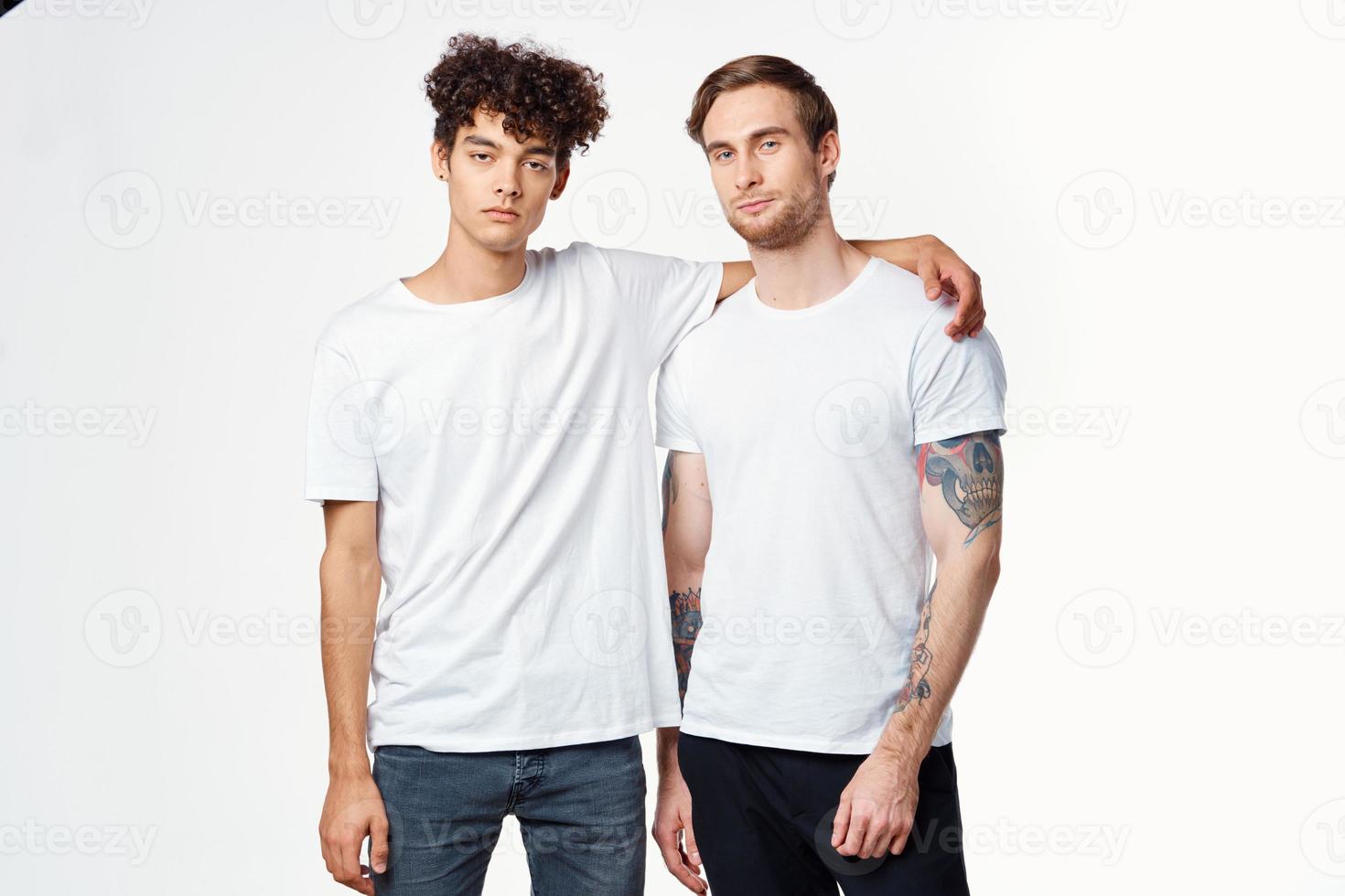 two men friendship hug emotions communication studio photo