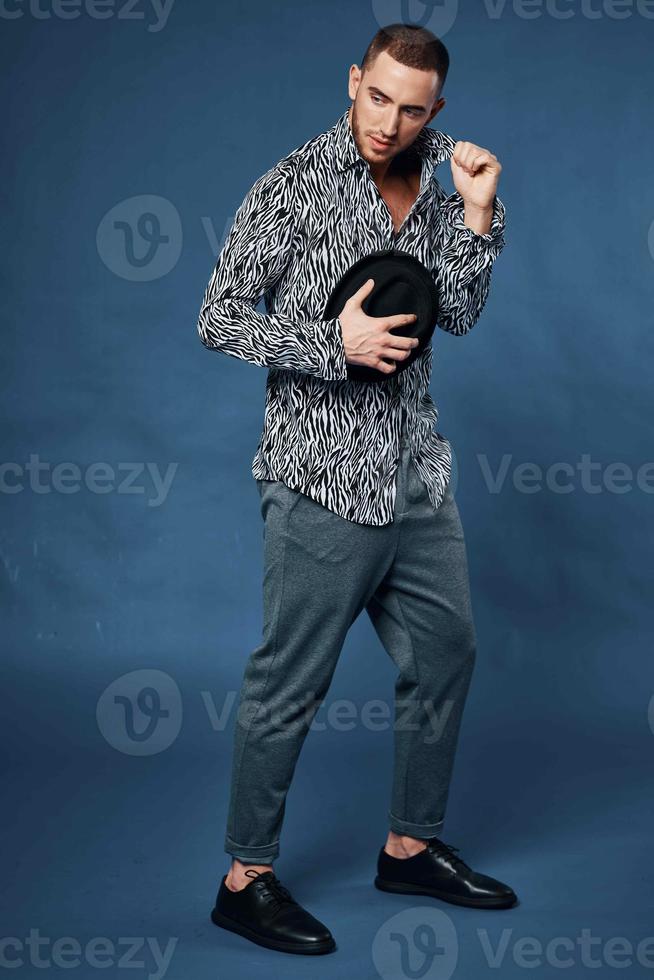 man in shirt wearing black hat posing fashion elegant style photo
