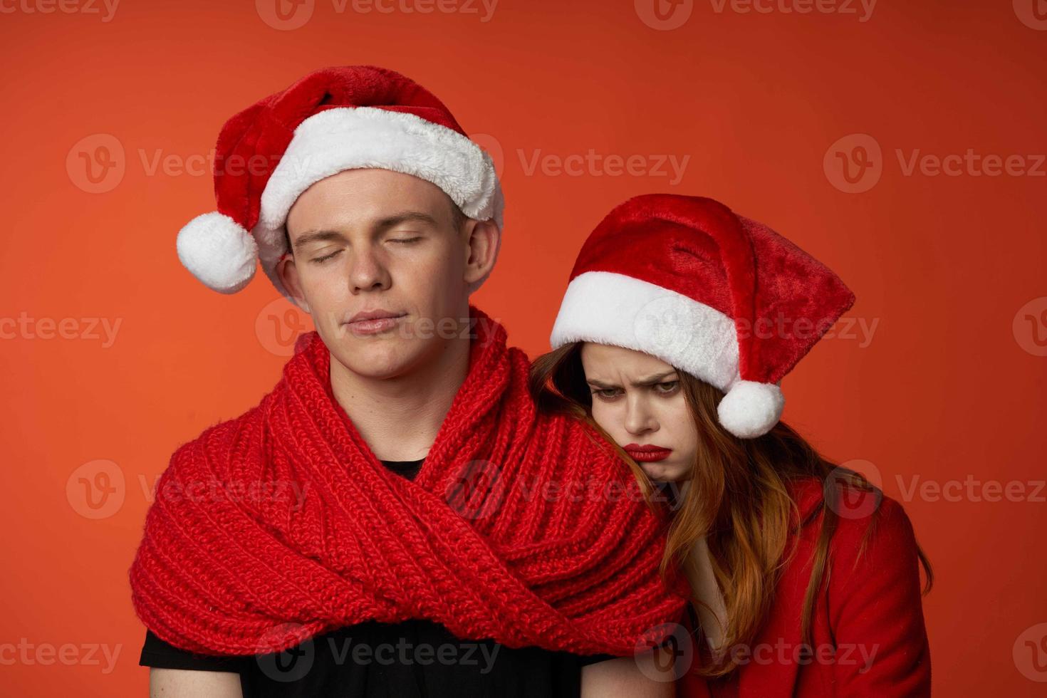 young couple in New Year's clothes Christmas holiday isolated background photo