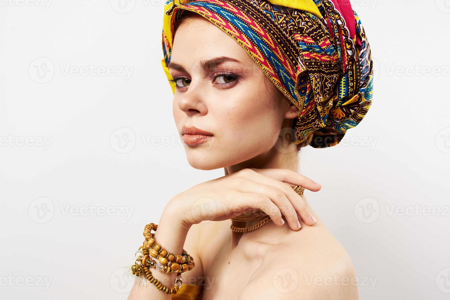 cheerful pretty woman multicolored turban african style close-up photo
