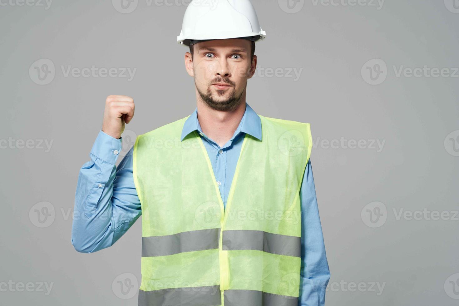 man reflective vest Professional Job light background photo