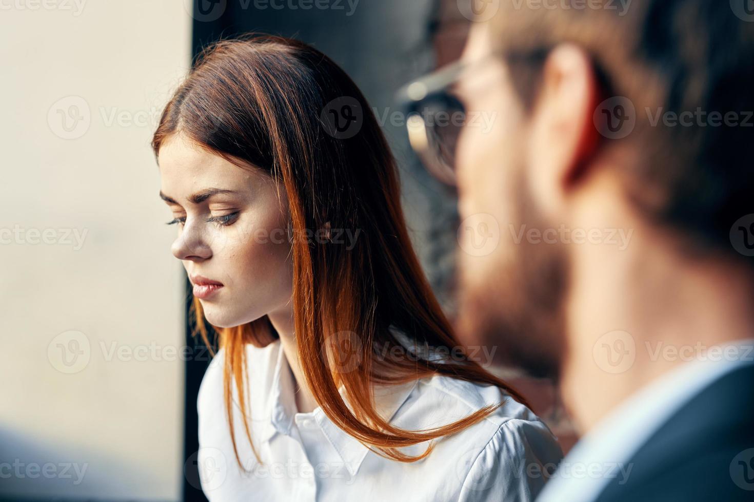 business man and woman sitting in a restaurant breakfast communication work photo