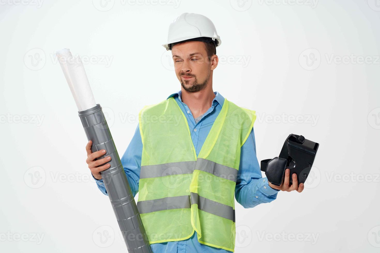 construction worker in working form blueprints virtual reality glasses construction photo
