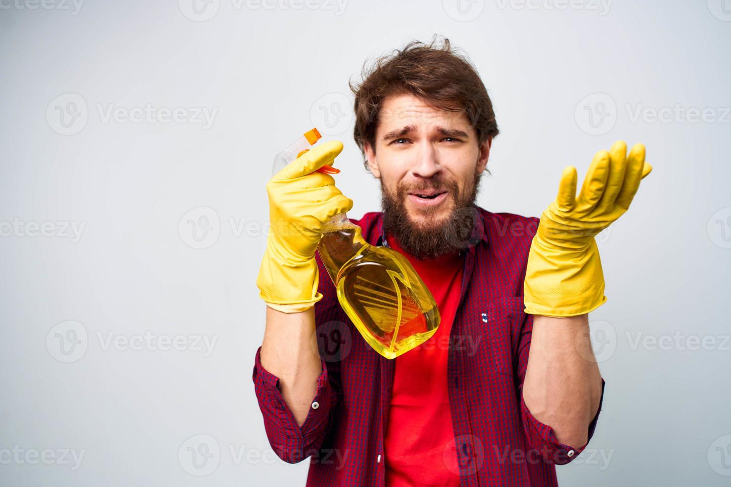man wearing rubber gloves detergent homework lifestyle photo
