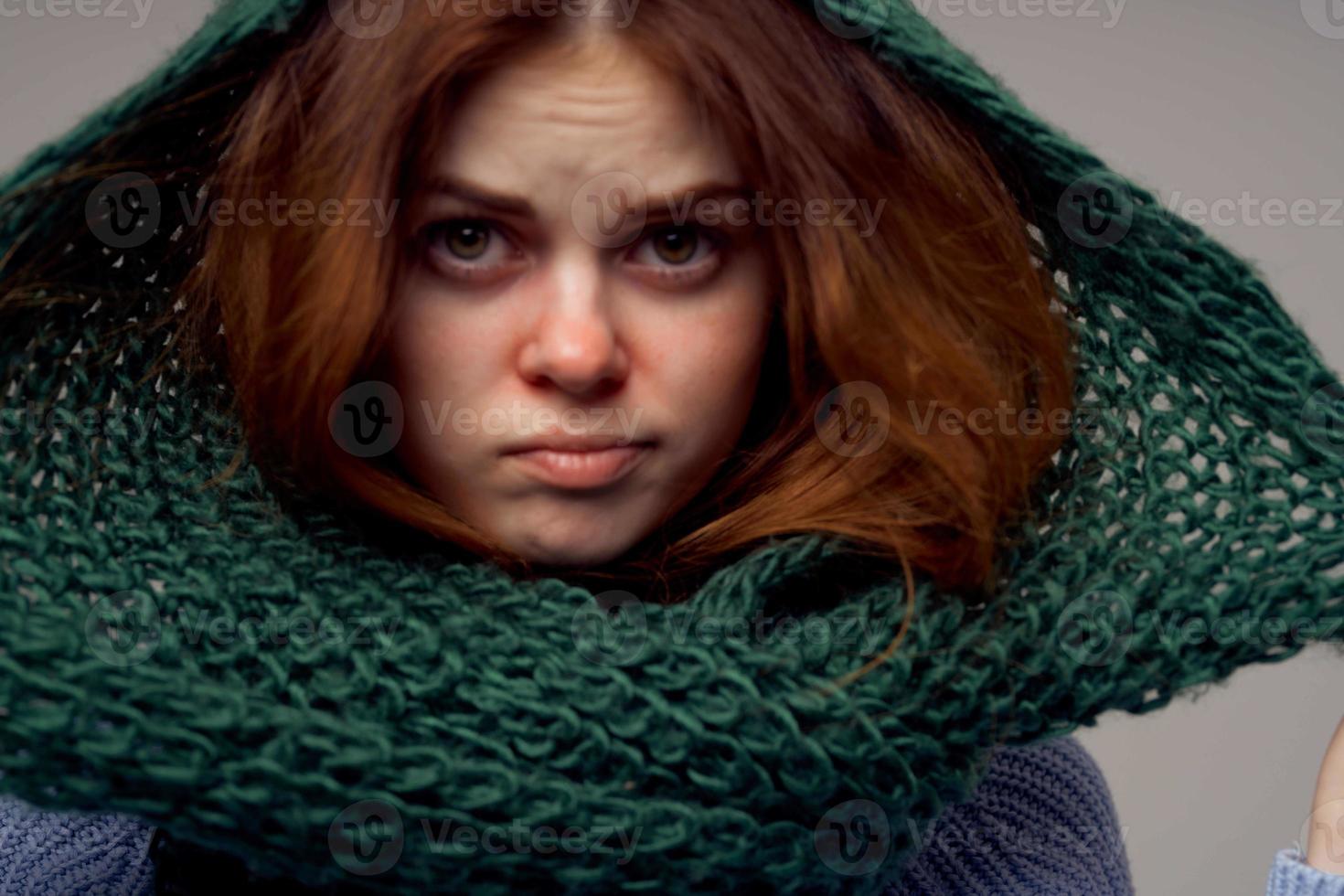 red-haired woman health problems temperature close-up photo