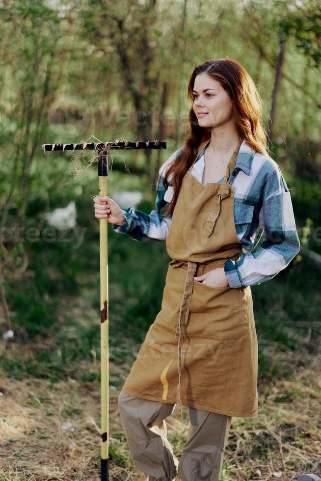 A person standing in the grass photo