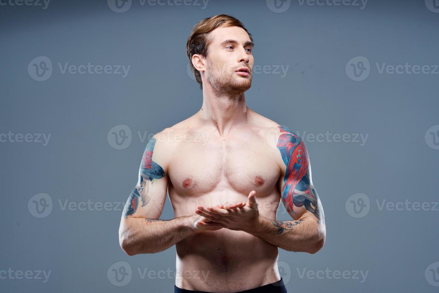 Athletic Man and Bodybuilder Fitness Muscle Muscle Tattoo Model photo
