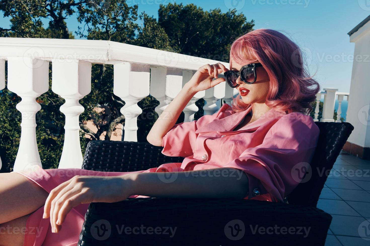 fashionable woman on the terrace Summer day photo