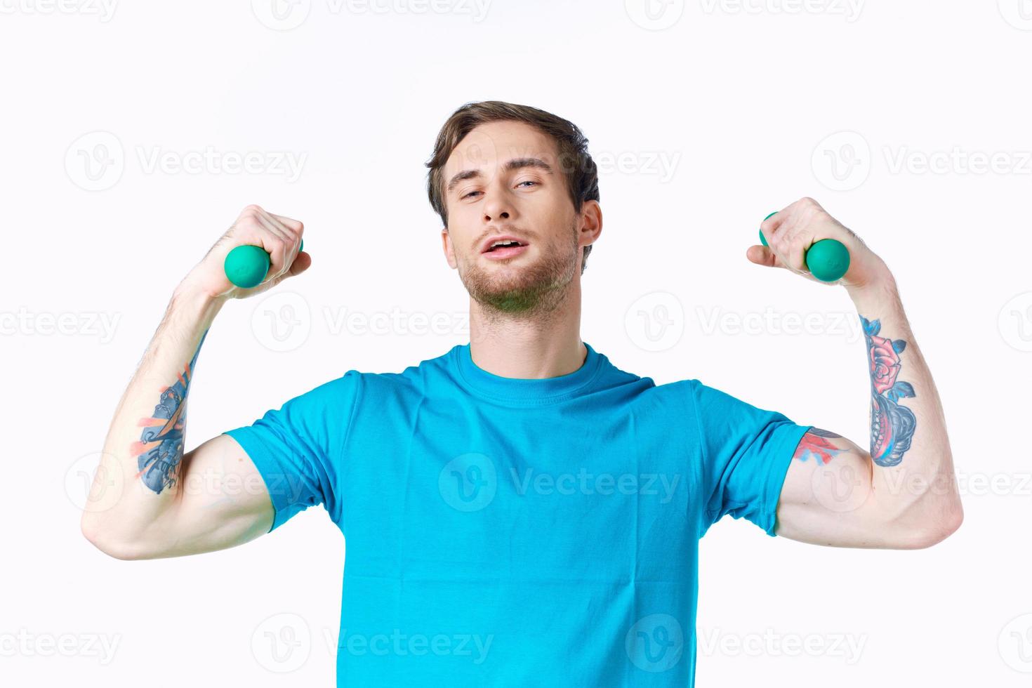 sporty man with pumped up arms tattoo exercise cropped view fitness photo