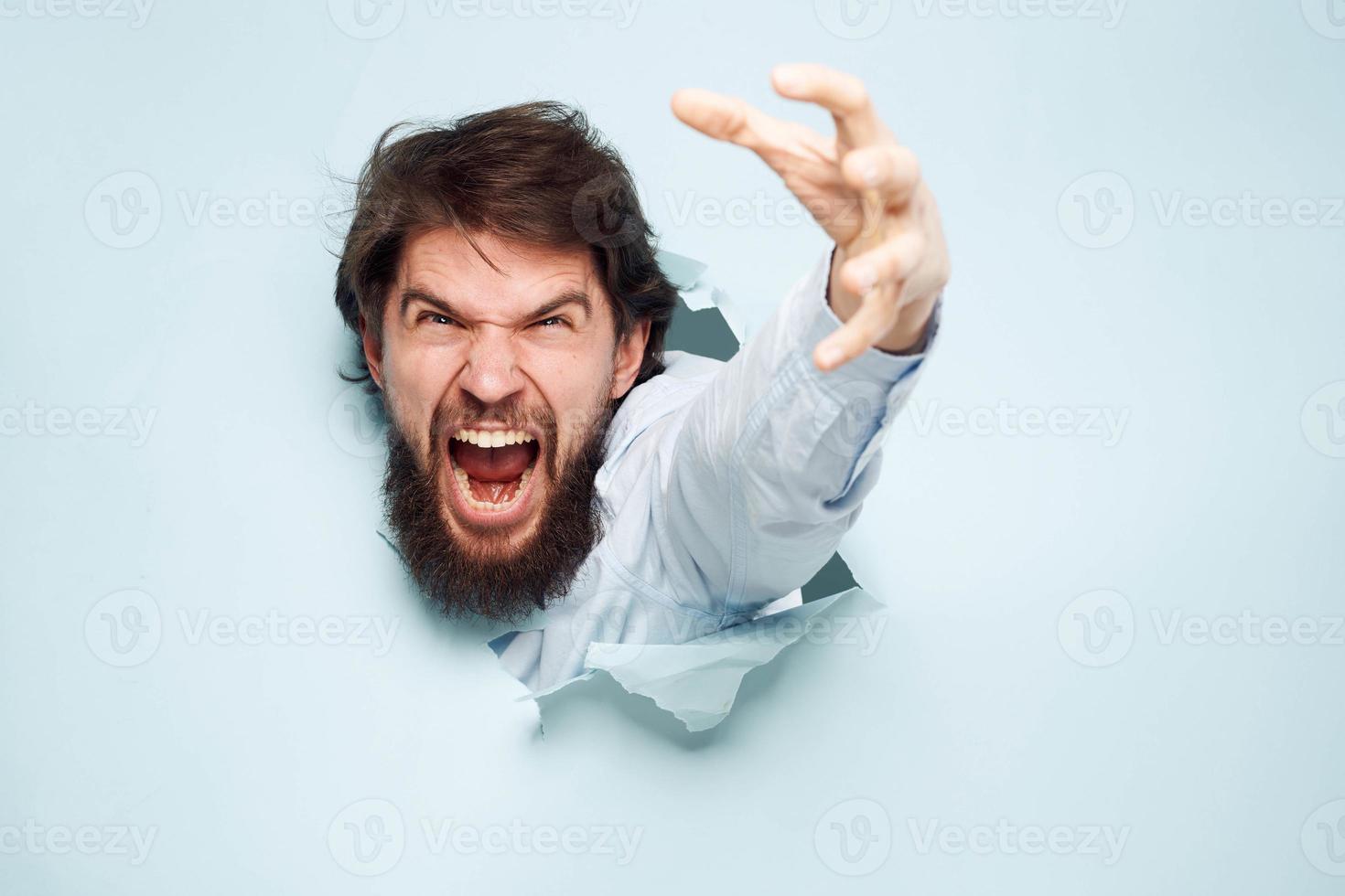 Angry man gestures with his hands dissatisfaction emotions work office photo