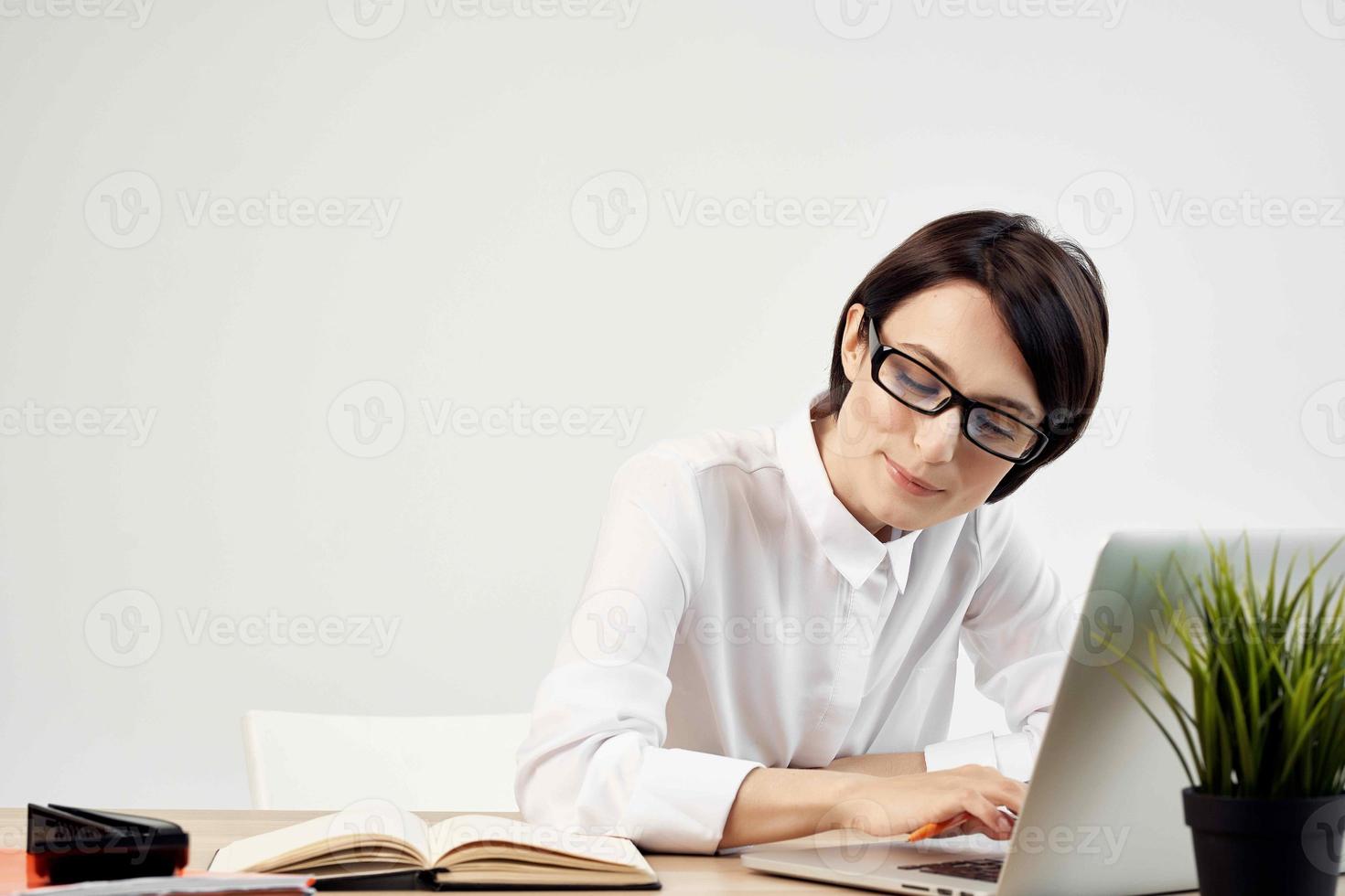 Businesswoman at the desk documents Professional Job light background photo