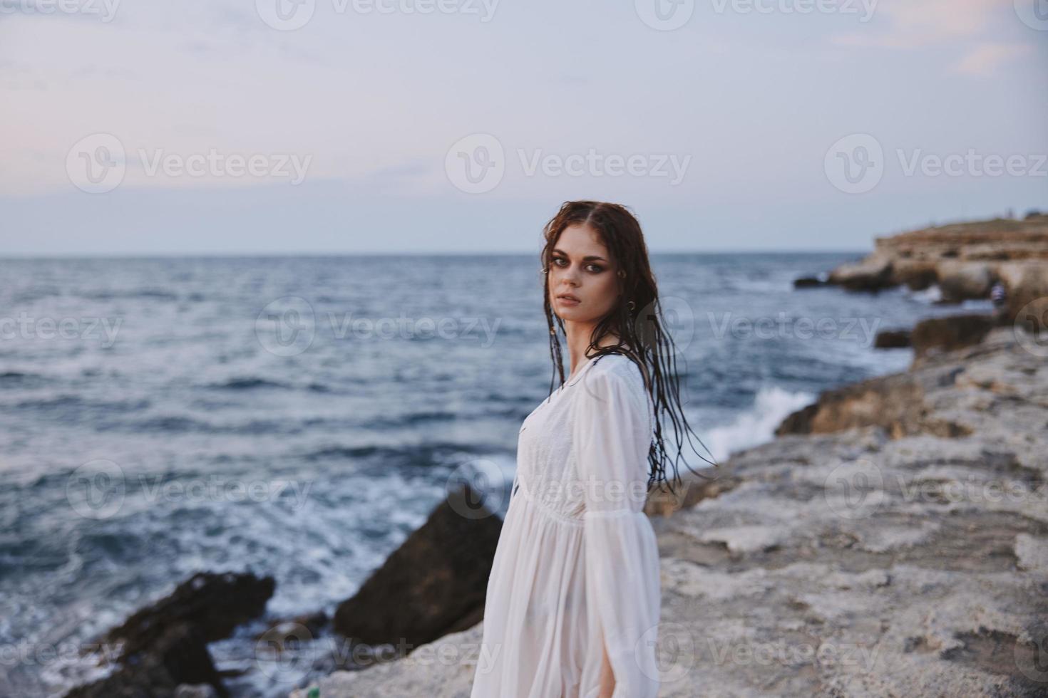 woman traveler white dress standing outdoor Lifestyle photo