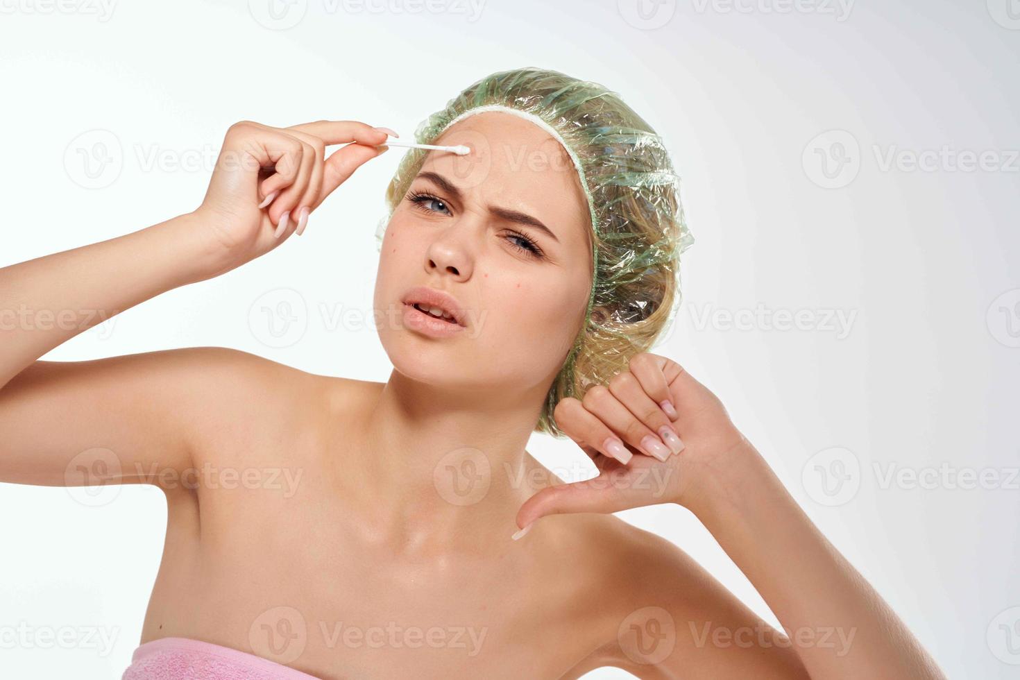 pretty woman with bare shoulders facial cosmetics photo