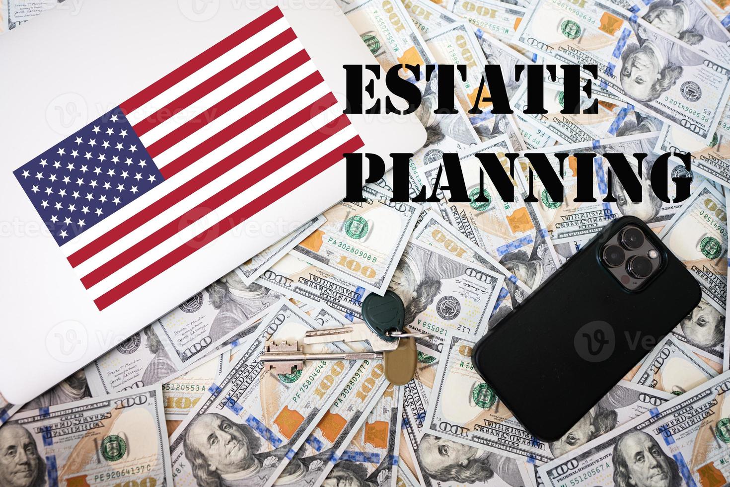 Estate planning concept. USA flag, dollar money with keys, laptop and phone background. photo