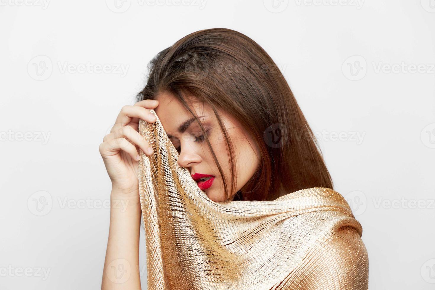 Woman with a scarf Eyes closed luxury model red lips photo