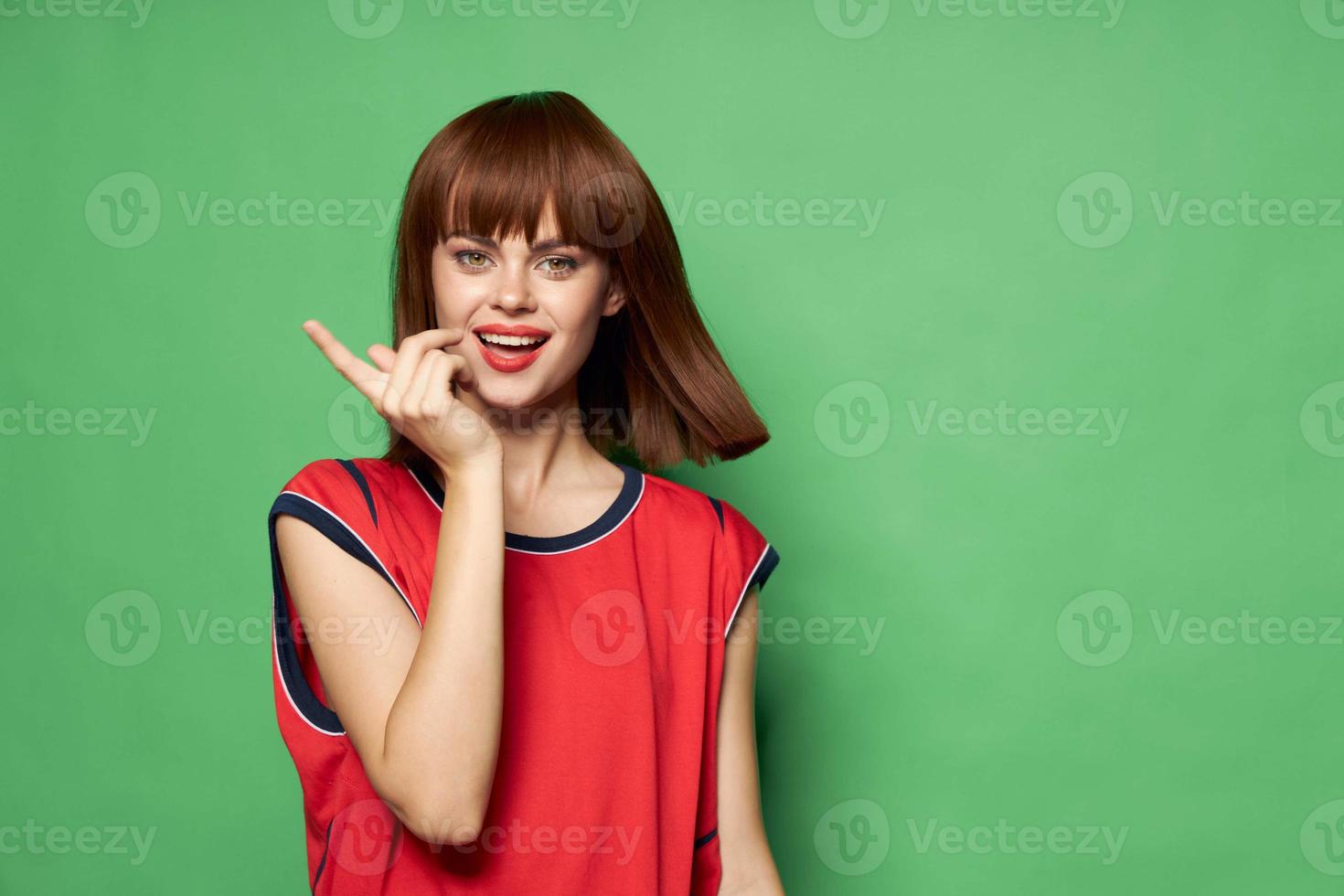 woman flirts with camera and shows finger photo