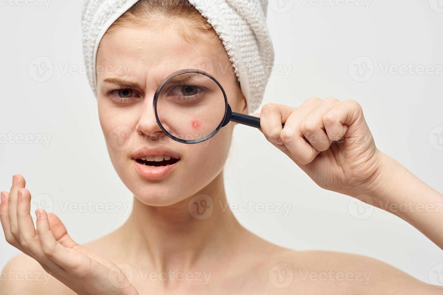 woman with a towel on my head dermatology isolated background photo