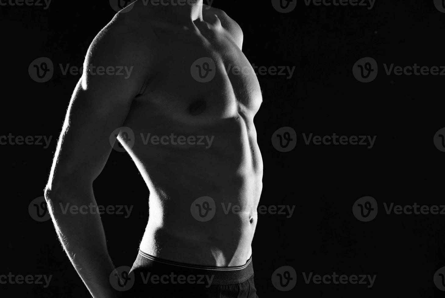 athletic man with a pumped-up body black and white photo male exercise