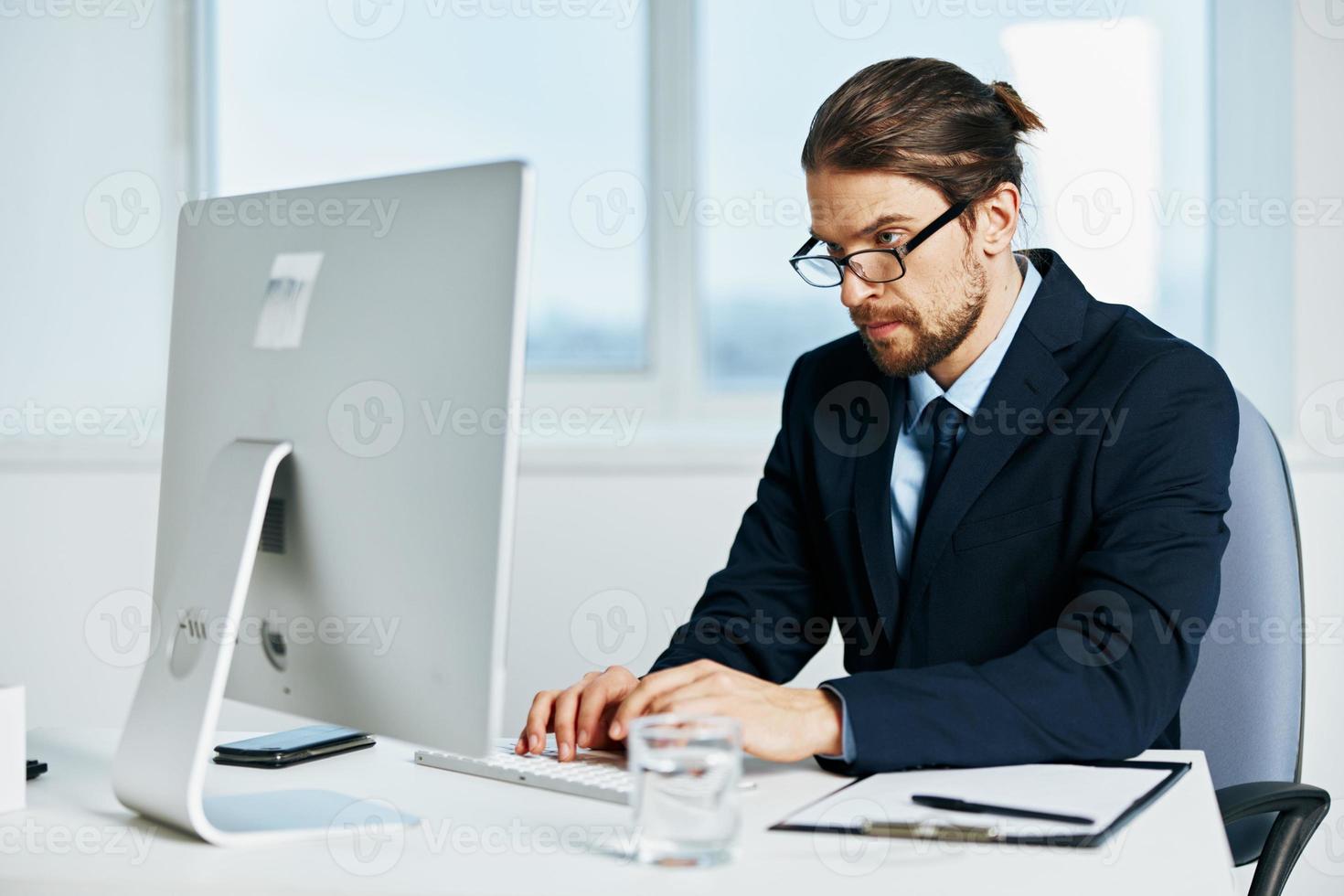 businessman work in front of a computer documents Lifestyle photo