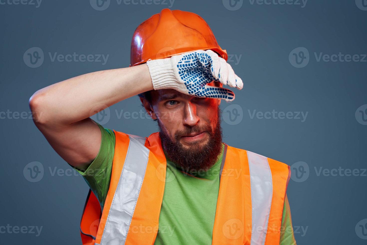 A man in orange paint. Hard work of a builder 22004819 Stock Photo at