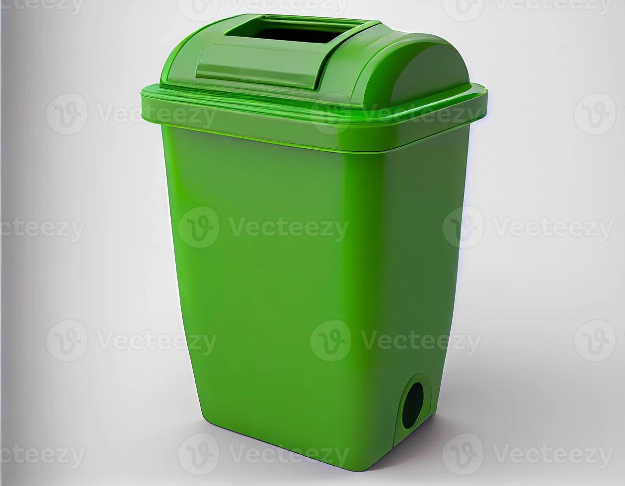 green trash can on a white background. waste tank. photo