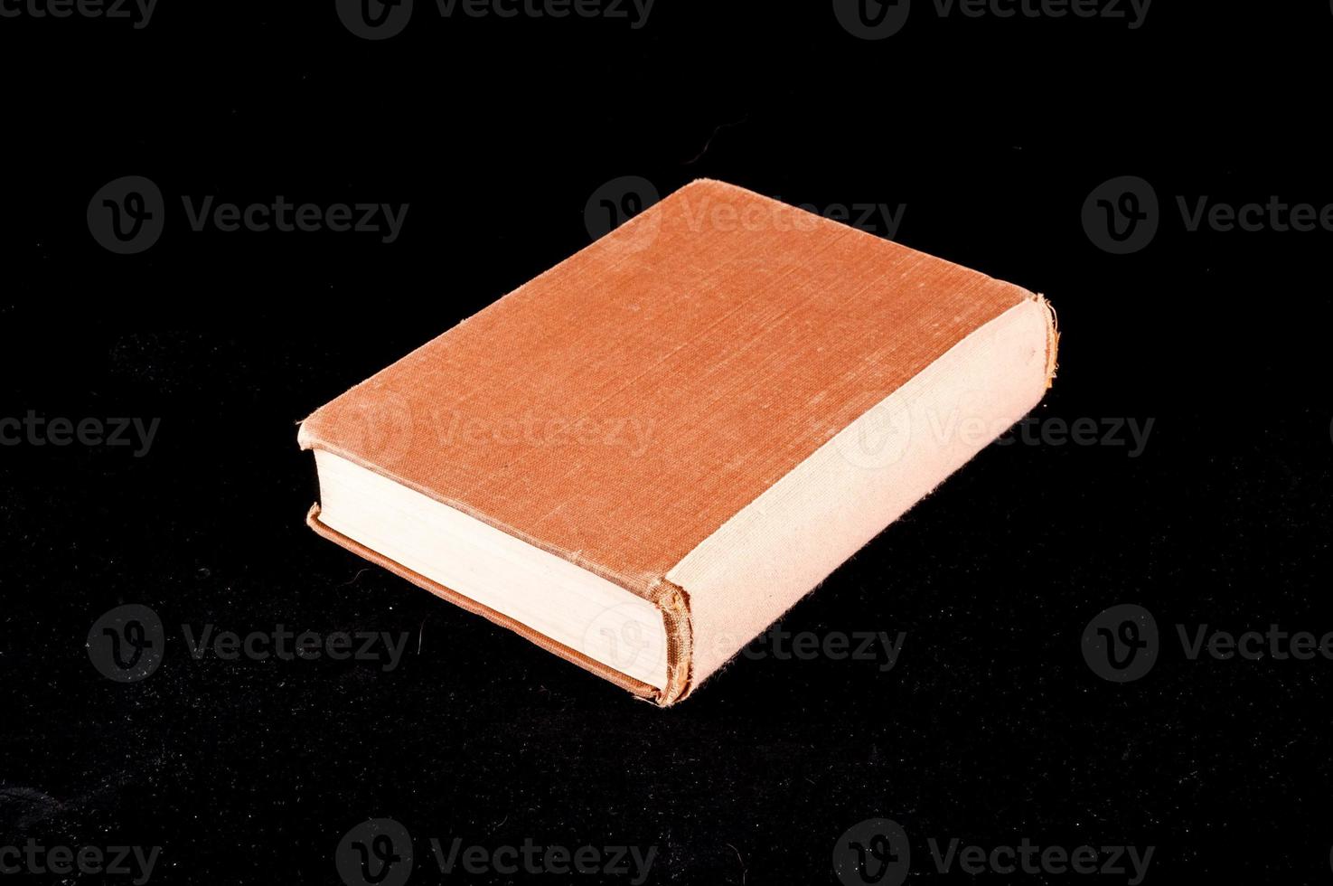 Book on dark background photo
