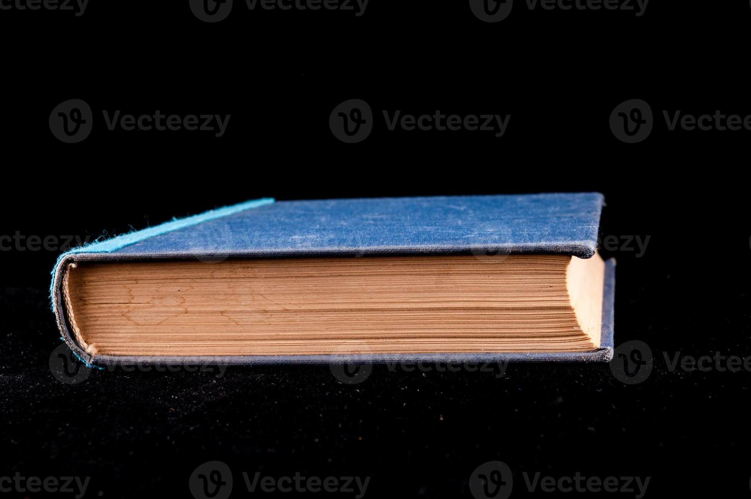 Book on dark background photo