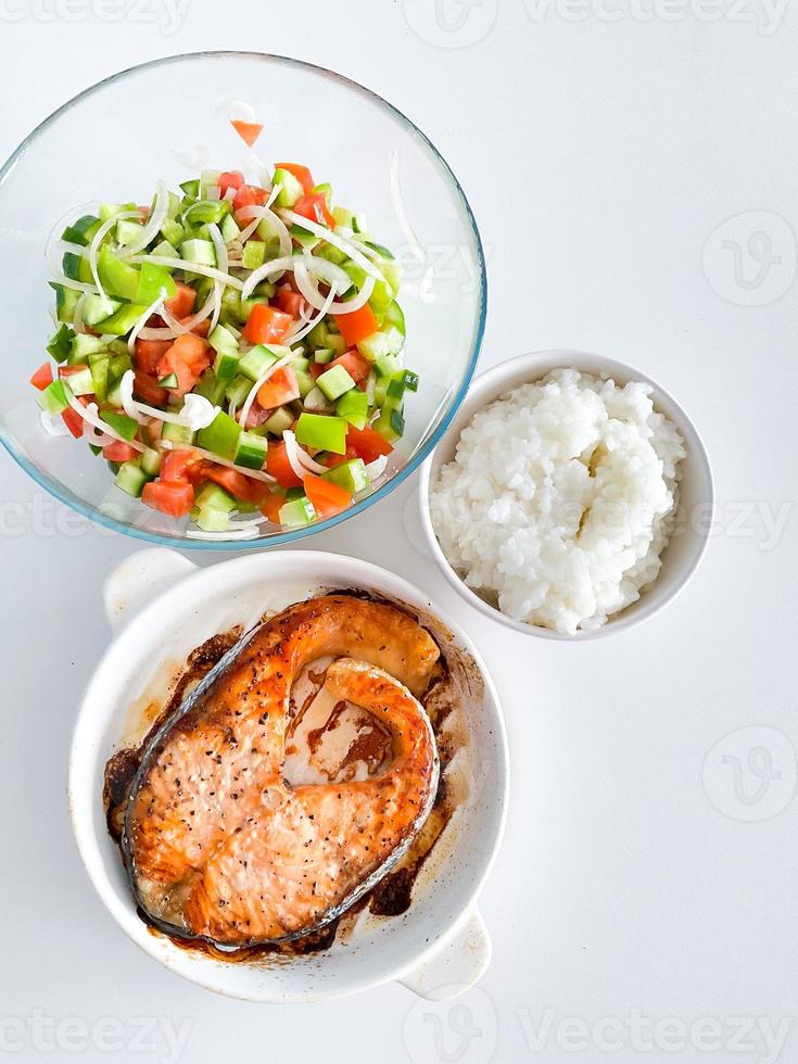 Healthy balanced meal lunch plate - baked salmon photo