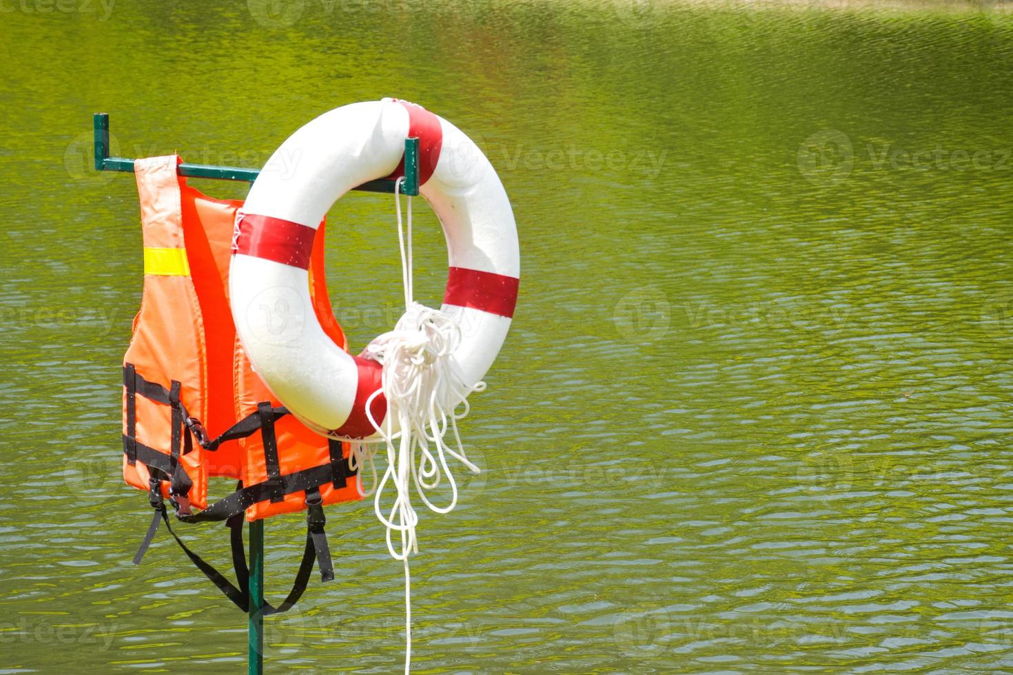 Life jackets and floats save life by the water and the scenery in Queen Garden Park in Bangkok, Thailand. photo