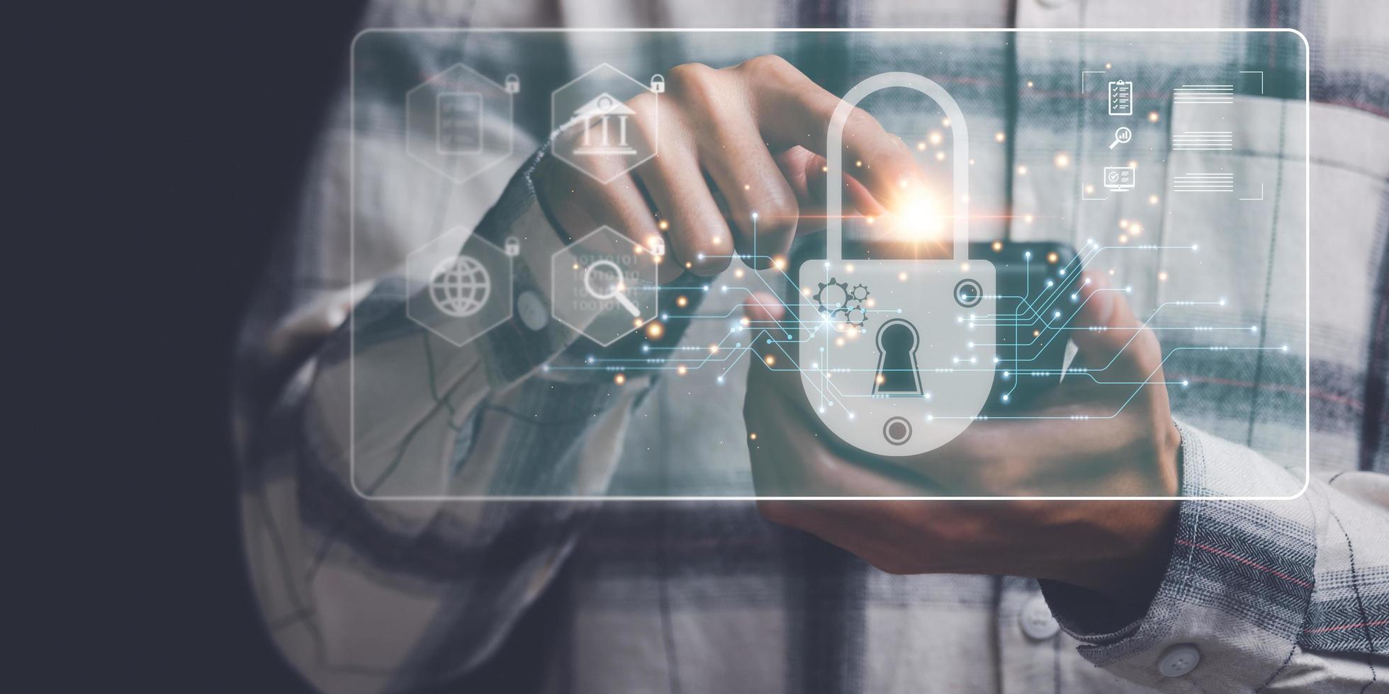 Businessman showing data access protection with key icon,Protecting data from theft ,secure login authorization,digital security unlocking or encryption, virus protection and safety alerts photo
