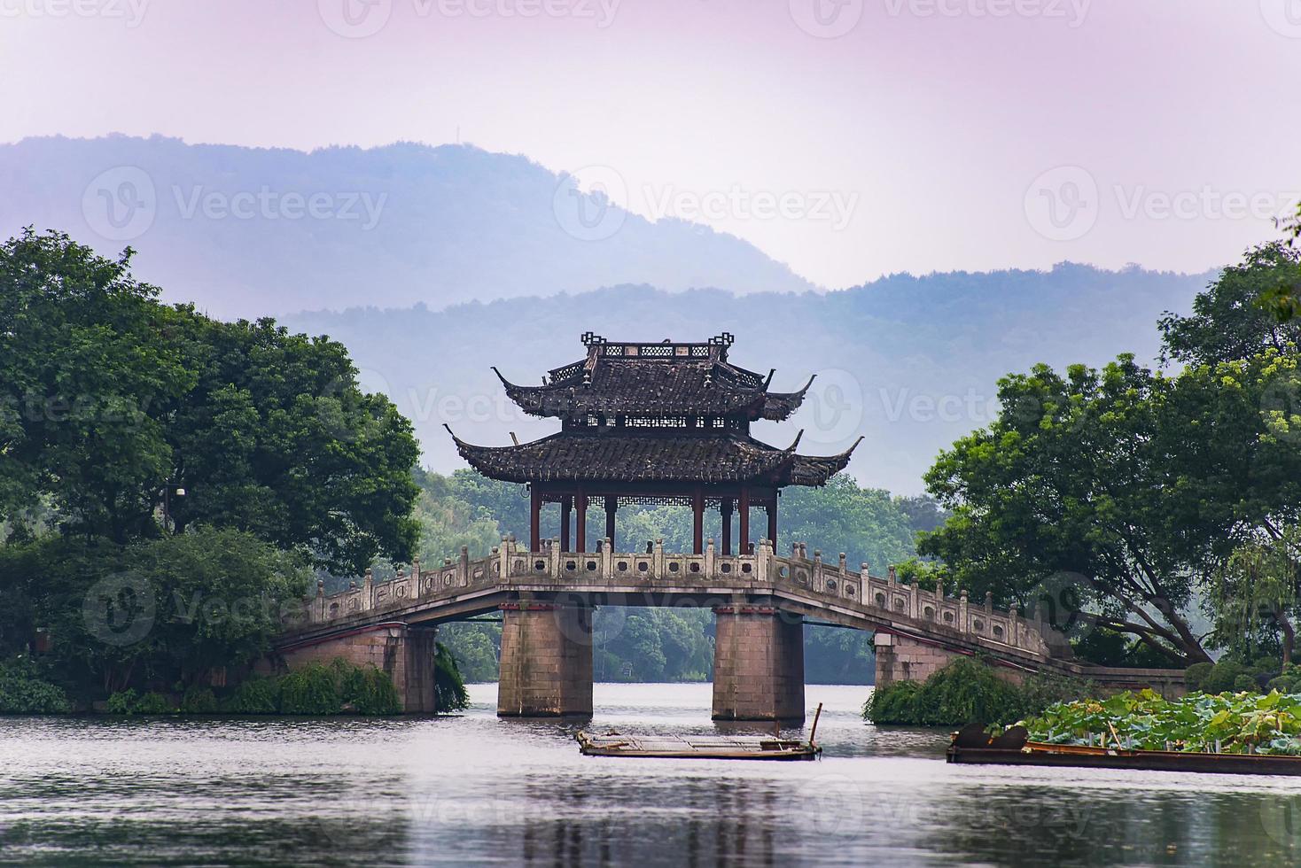 a very famous pavilion bridge-yu dai qiao - in west lake, hangzhou, china was built in song dynasty and rebuilt in qing dynasty photo