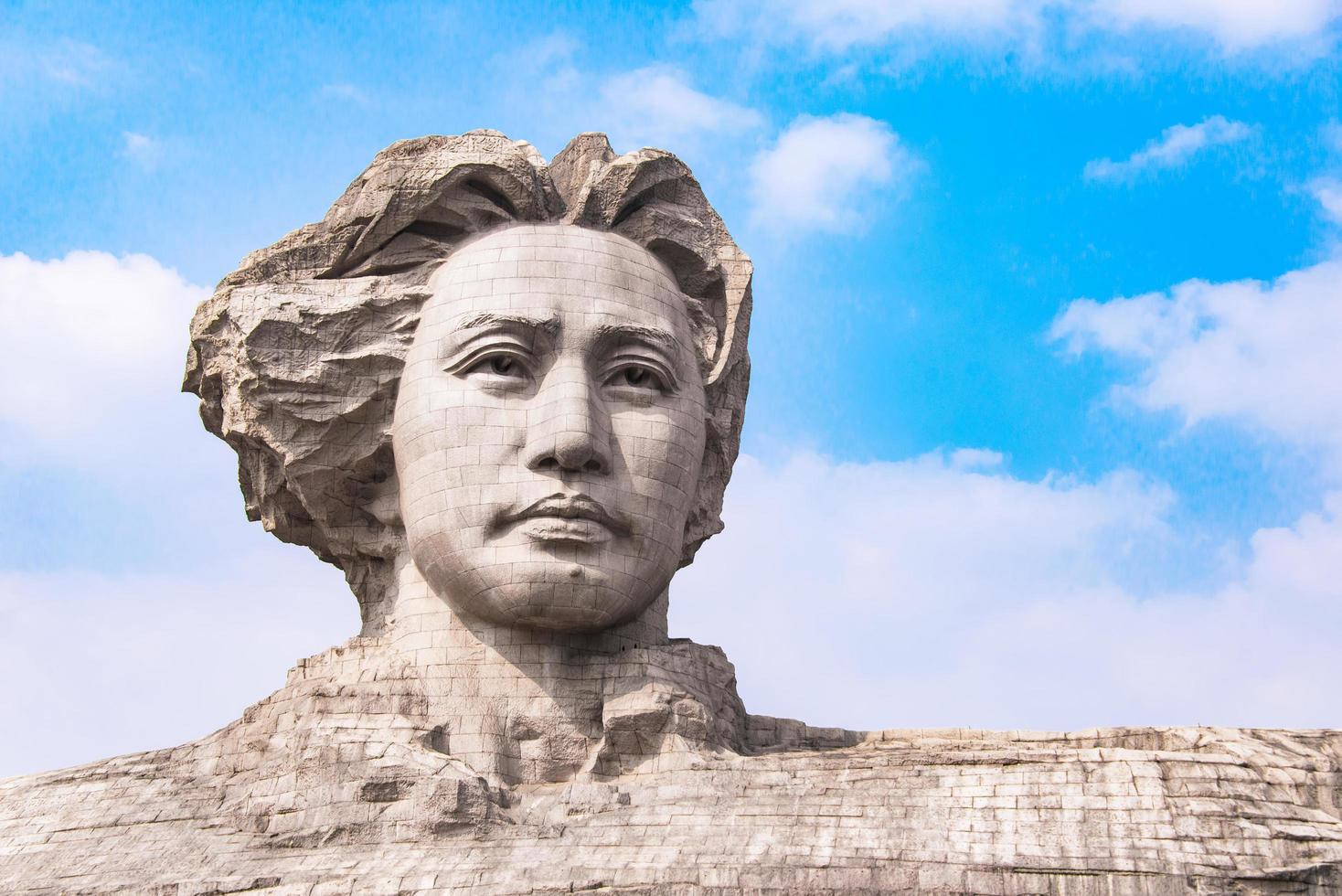 CHANGSHA, CHINA - OCT 29, 2017-Youth Mao Zedong Statue is located in Orange Isle, Changsha, Hunan, China. The monument stands 32 metres tall. photo