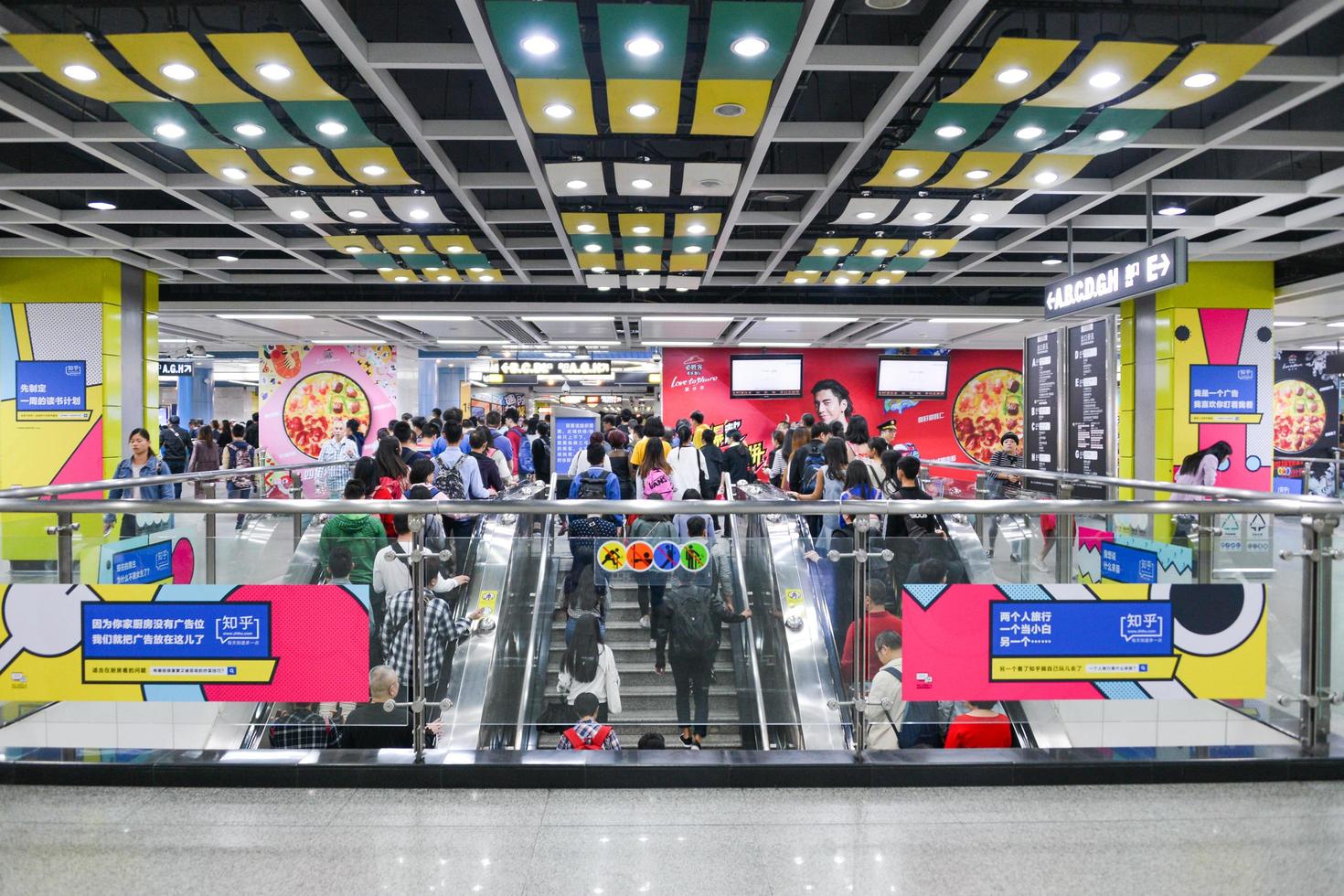 GUANGZHOU, CHINA - APR 02, 2017-Passengers at  subway station in Guangzhou city. The busy and rush life of crowed people on April, 02 2017. photo