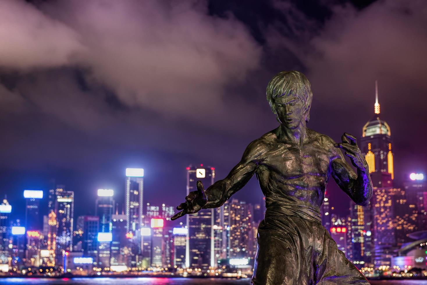 Hong Kong. JUNE 08,  bruce Lee's statue at night in Hong Kong's Vicotria harbour, JUN 08 ,2015 in Hongkong photo