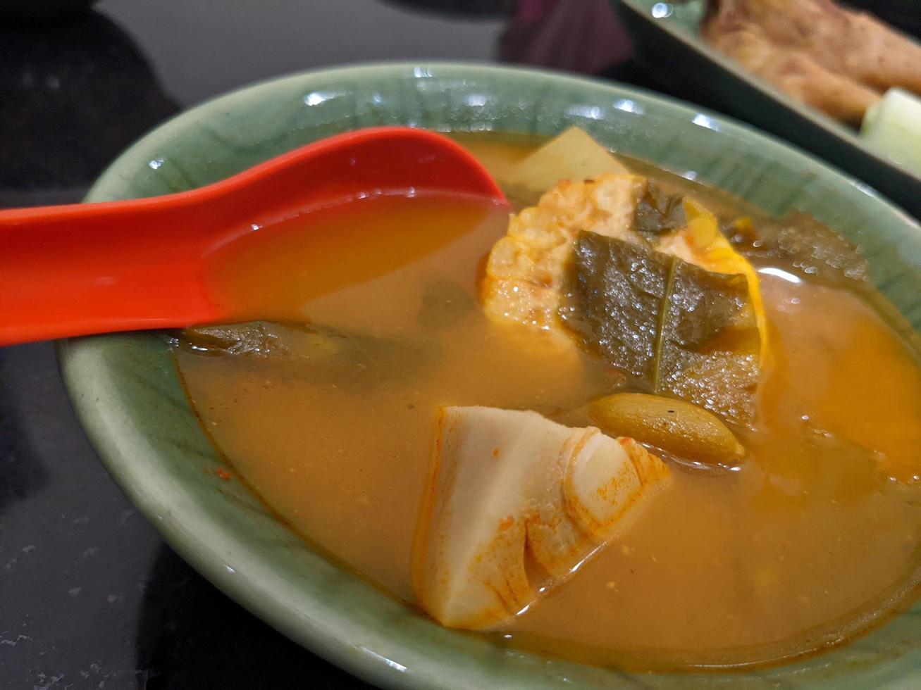 Sayur Asem traditional food of Javanese Indonesia, vegetable food with traditional taste. The photo is suitable to use for food background, poster and food content.