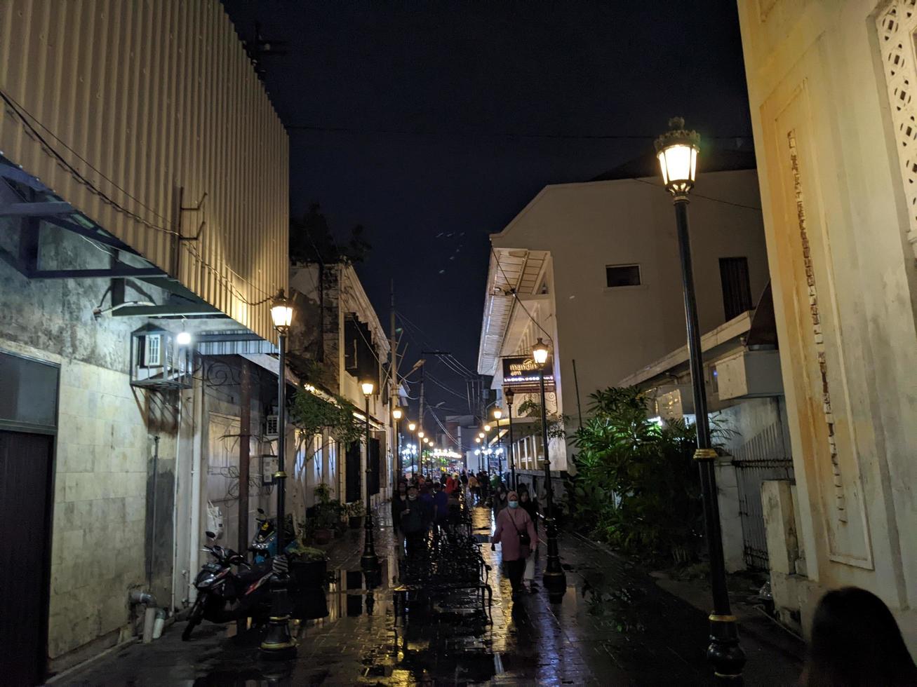 Night walker on the light of downtown city. The photo is suitable to use for city landscape background and night light.